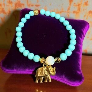 Turquoise Beaded Bracelet with Gold Elephant Charm